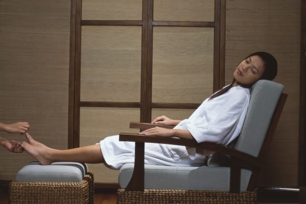 Woman having a pedicure in spa Woman having a pedicure in spa